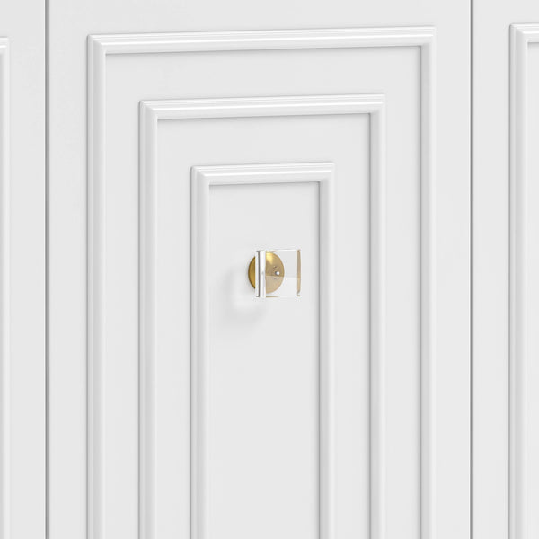 Close-up of a white 3-door sideboard door with a gold doorknob