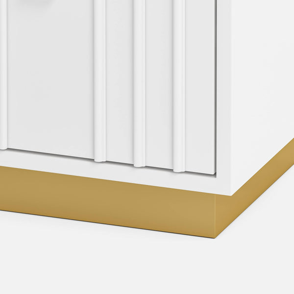 Close-up of a white sideboard with a gold base on a white background